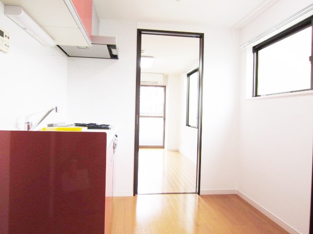 Living and room. Kitchen part is also bright. 