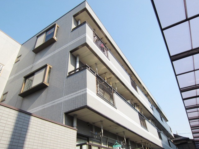 Building appearance. Beautiful apartment appearance tiled