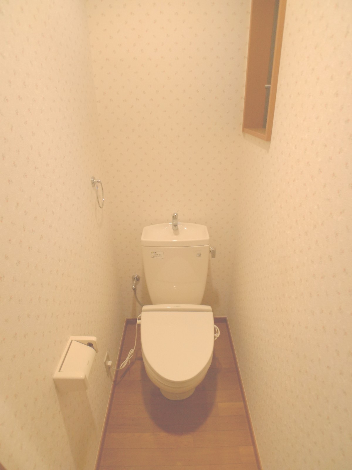 Toilet. A heated toilet seat