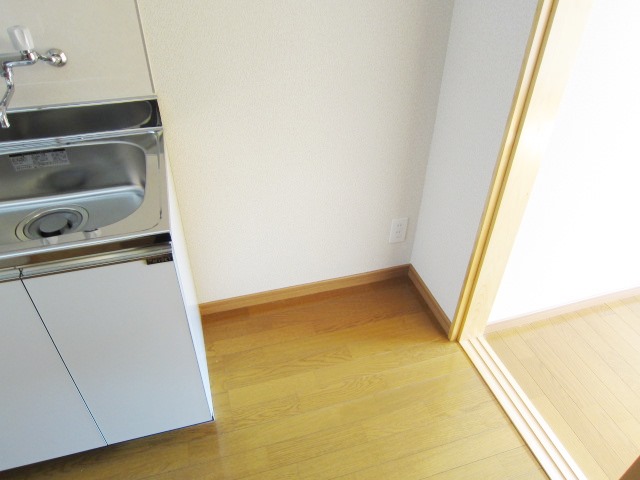 Kitchen. There is a refrigerator yard