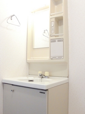 Washroom. Towels hung