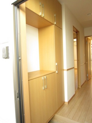 Entrance. It is a large shoes BOX