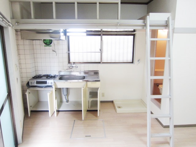 Living and room. There is a small window in the kitchen