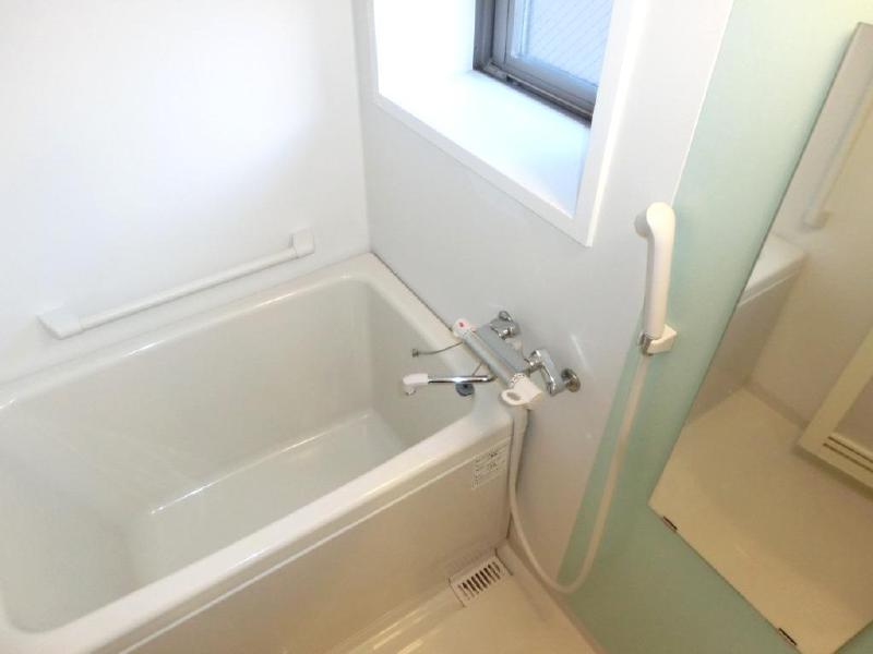 Bath. This room with a window.