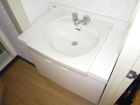 Washroom. There is a separate wash basin.