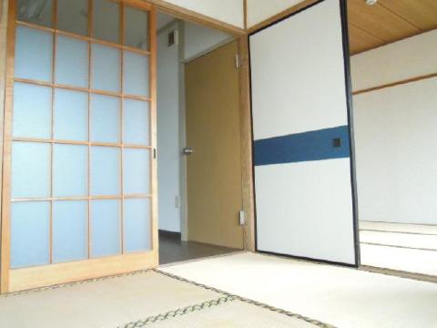 Living and room. Following is a Japanese-style room.