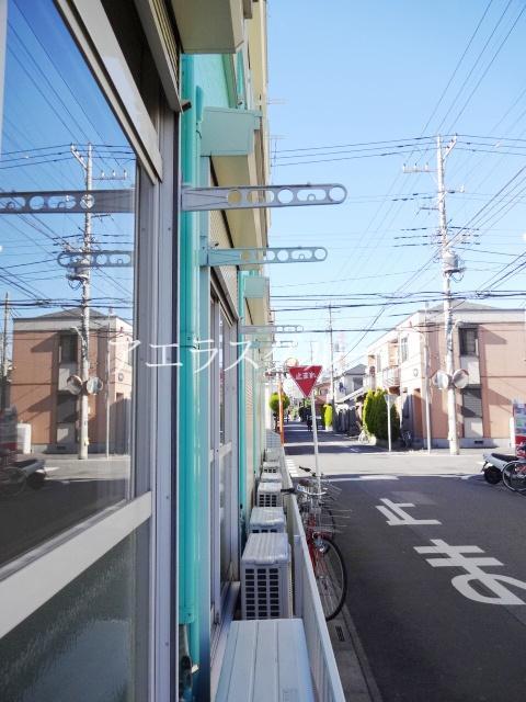 Balcony. Good day is Jose out of the weather