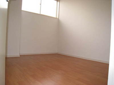 Living and room. It is a loft with a room