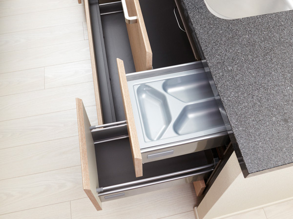 Kitchen.  [Soft-close function with slide storage] In the kitchen, It has established an accommodation that slowly can smooth opening and closing. It is safe less risk to sandwich the finger even when the rush in cooking.  ※ Same specifications