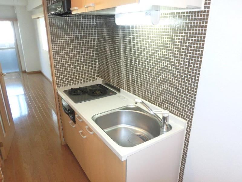 Kitchen. Two-burner gas stove is with the system Kitchen