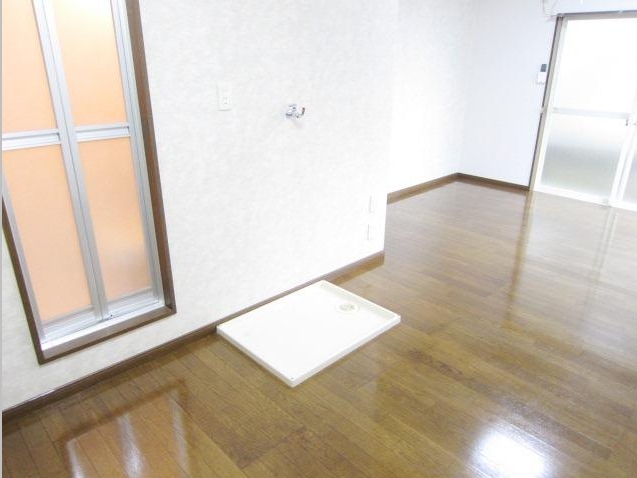 Other Equipment. Washing machine in the room of women peace of mind