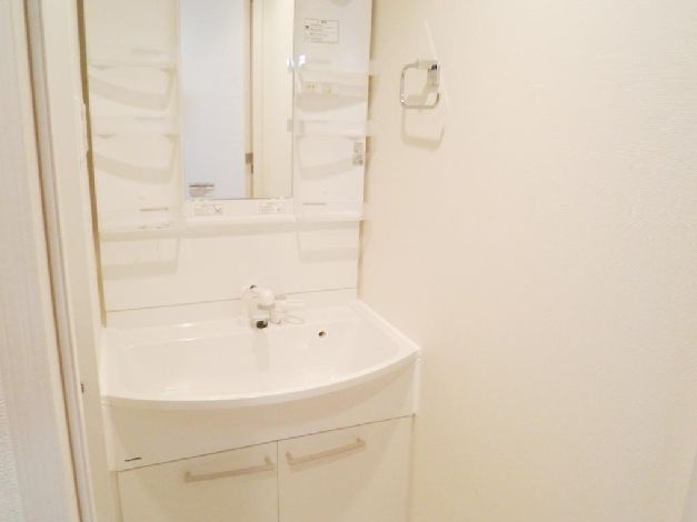 Washroom. Glad shower dresser in a busy morning