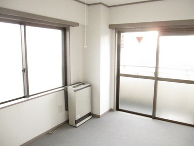 Living and room. Two windows, Bright studio in the two-sided lighting