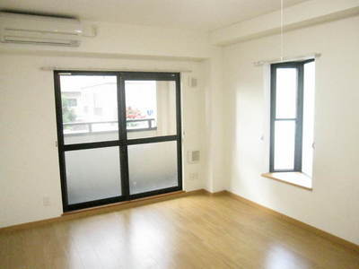 Living and room. Two windows, Bright studio in the two-sided lighting