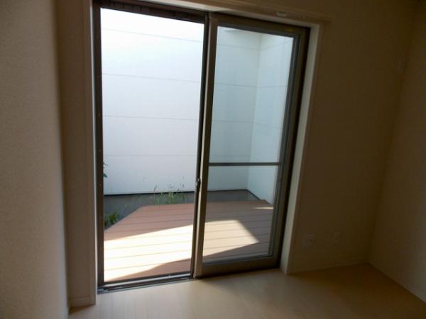 Garden. First floor south side wood deck