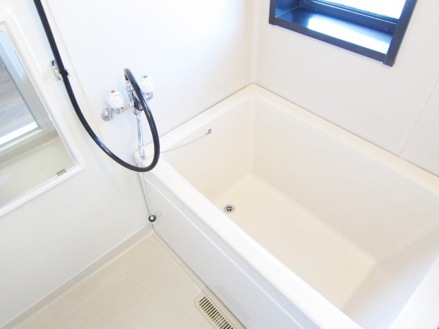 Bath. There is a small window in the bathroom