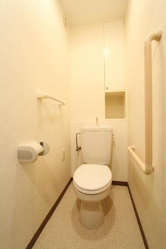 Toilet. There and happy with storage Detergent and toilet paper blindfold