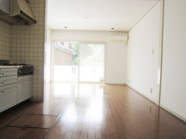 Living and room. It is the first floor, but contains the bright sunshine.