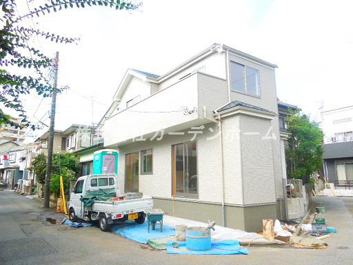 Local appearance photo. Station 11 minutes' walk ・ Day boast of a prime location in the popular counter kitchen corner lot two car space possible is the home of shopping facilities enhance the attractive southeast corner lot