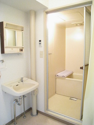 Washroom. Simple wash basin in the mirror with