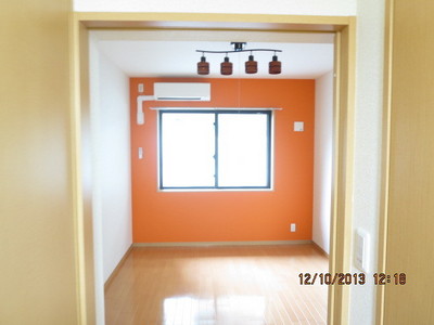 Living and room. It is a bright room.