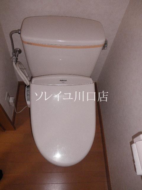 Toilet. Toilet with a clean sense of the white tones