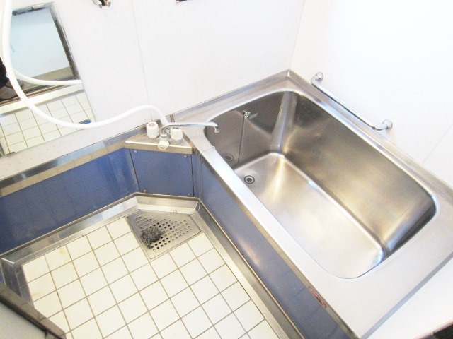 Bath. There is a small window in the bathroom