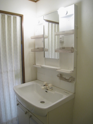 Washroom. Washstand storage rack is useful