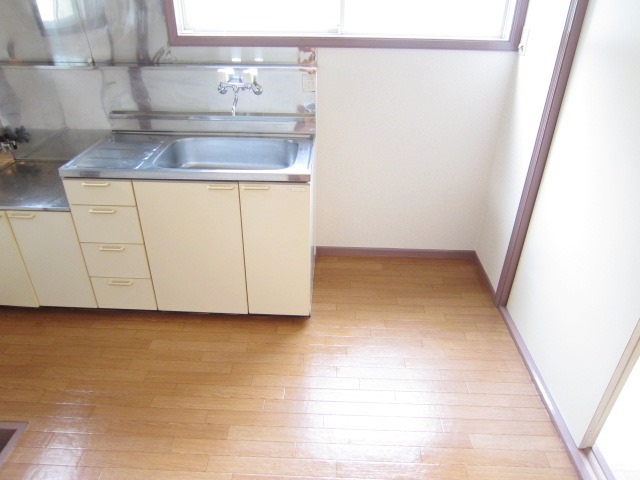 Other. There is a kitchen next to the refrigerator space