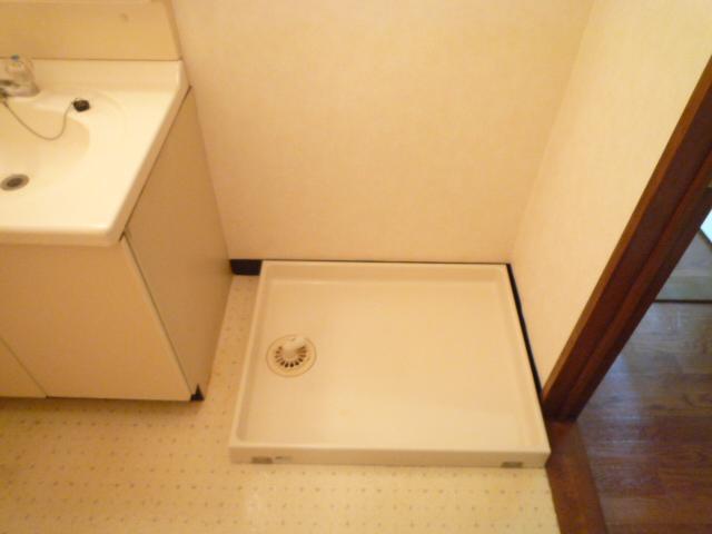 Other Equipment. Washing machine in the room