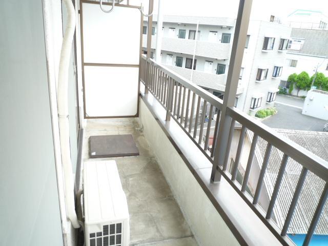 Balcony. It is a south-facing balcony with laundry dries. 