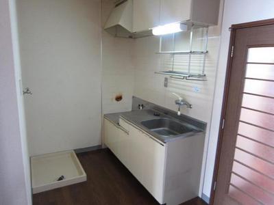 Kitchen. Washing machine is put space