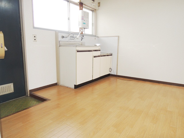 Kitchen. There is a small window in the kitchen