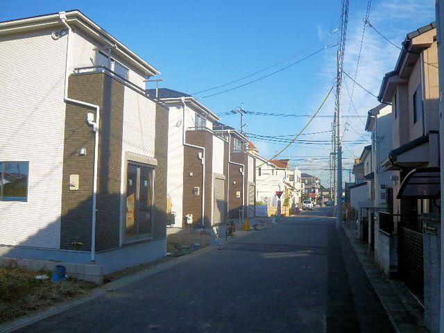 Local photos, including front road. 7 Building