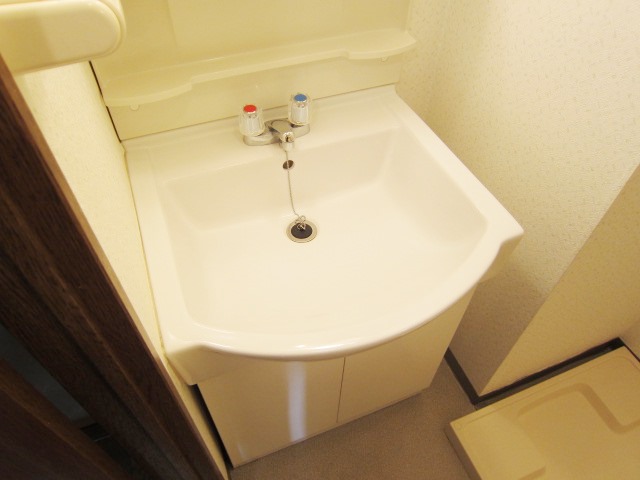 Washroom. Wash basin is equipped with independent