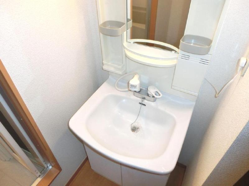 Washroom. Shampoo is with Dresser