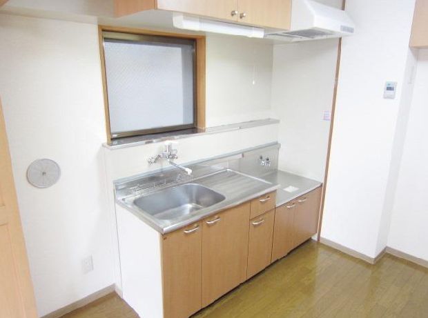 Kitchen. There is a small window in the kitchen