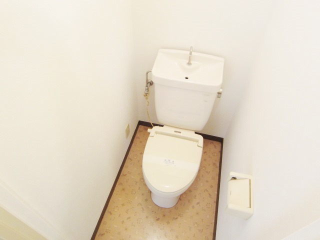 Toilet. There is an electrical outlet in the toilet