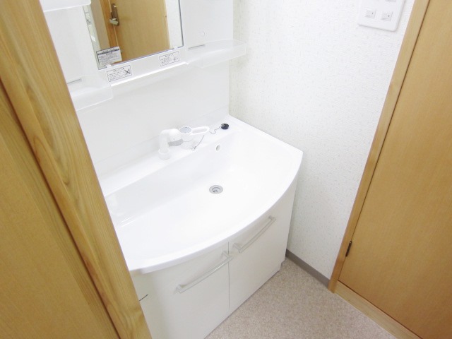 Washroom. Glad shower dresser in a busy morning