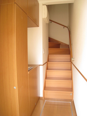 Entrance. There is a big shoes BOX