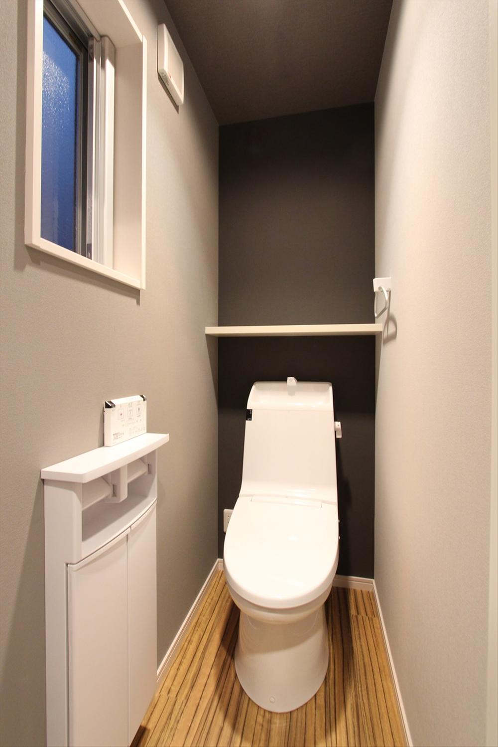 Toilet. It is a high-function toilet.