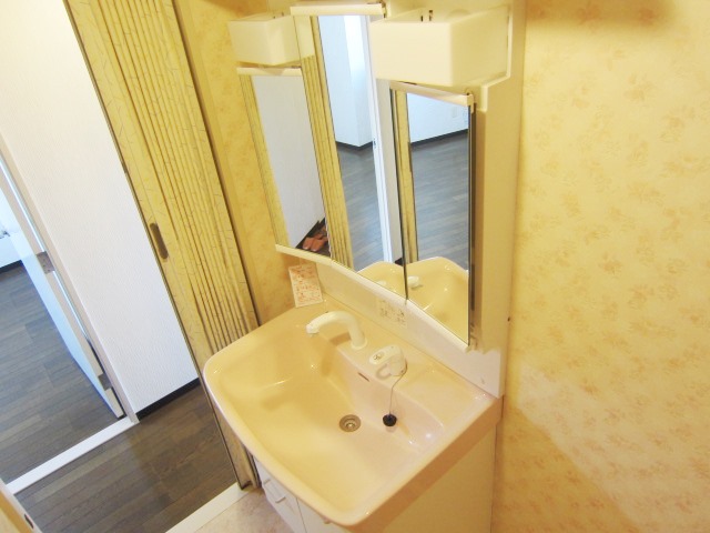 Washroom. Glad shower dresser in a busy morning