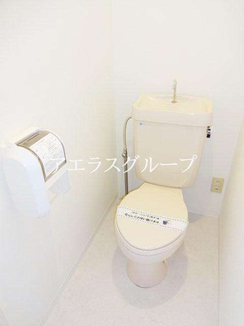 Toilet. Toilet with a clean sense of the white tones