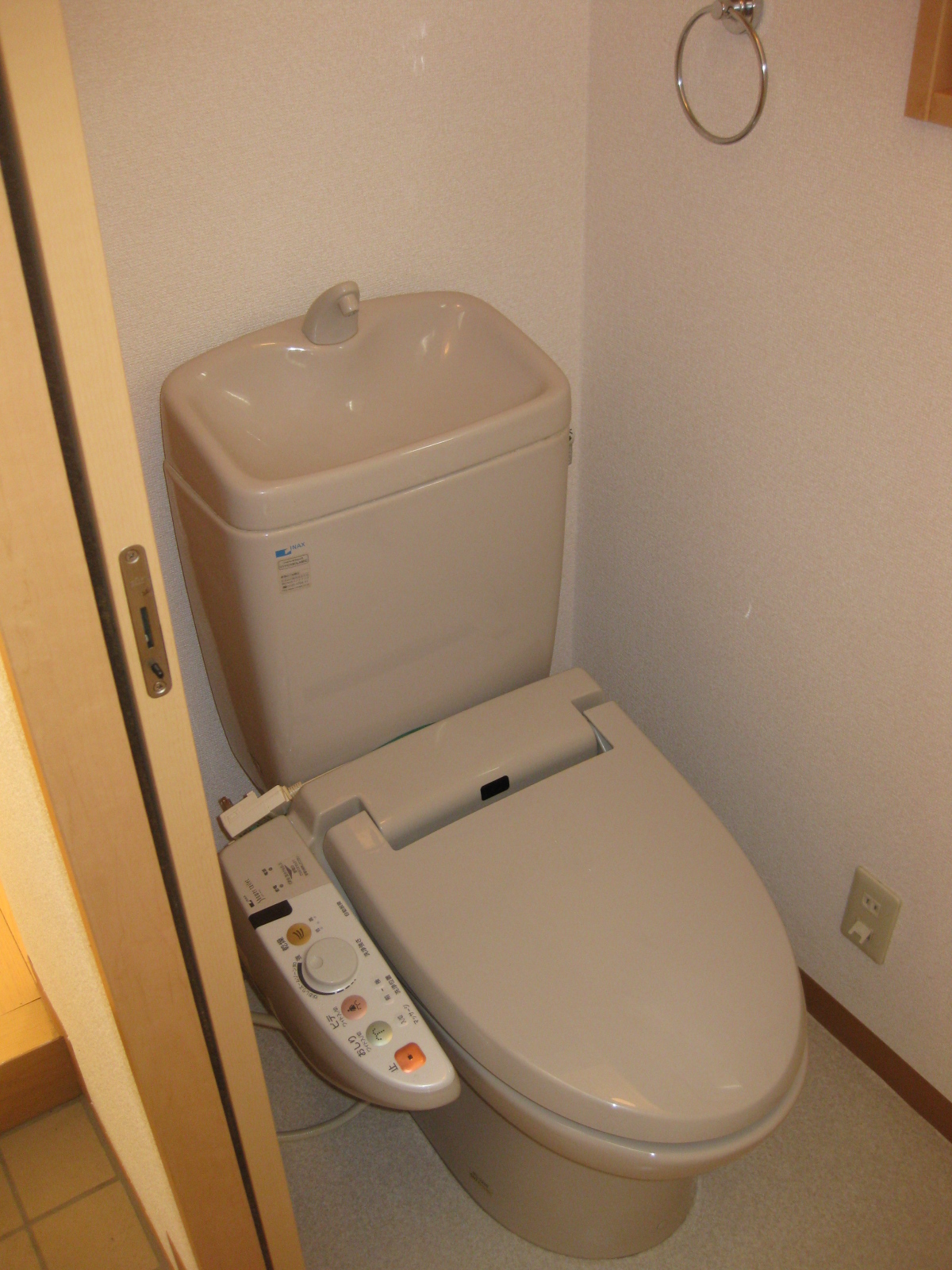 Toilet. Warm water washing toilet seat