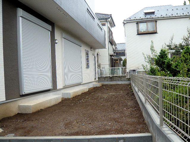 Garden. Southwest-facing garden The south side is a vacant lot.