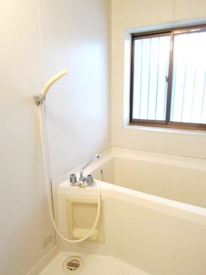 Bath. There is a window in the bathroom happy