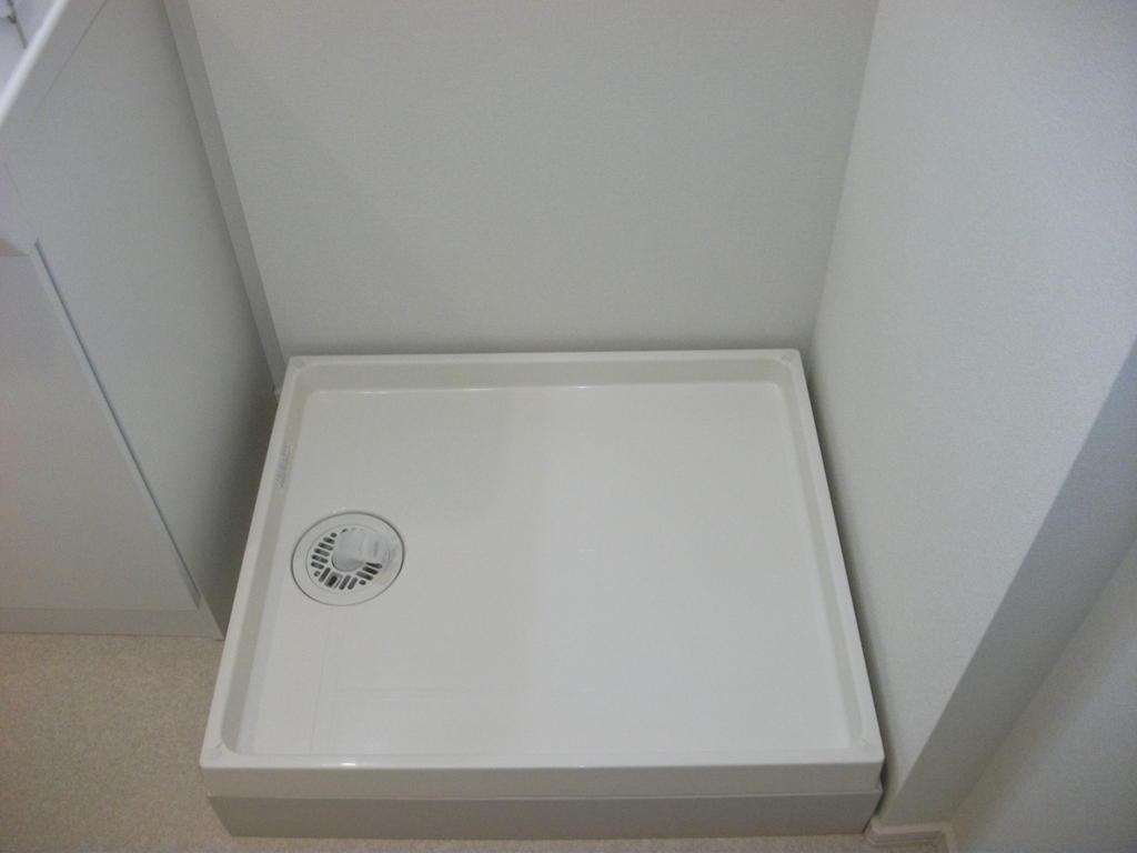 Washroom. Laundry Area is located in the washroom.