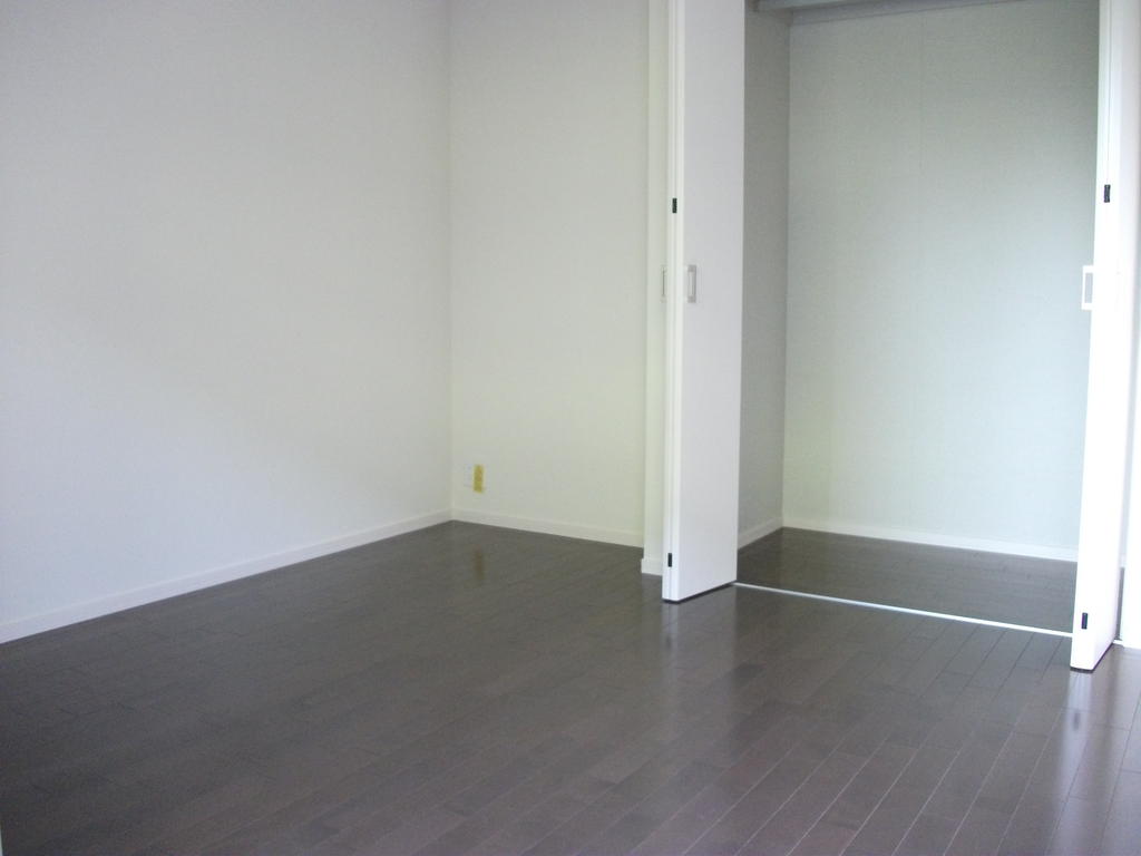 Living and room. The room was a brown and white and color.