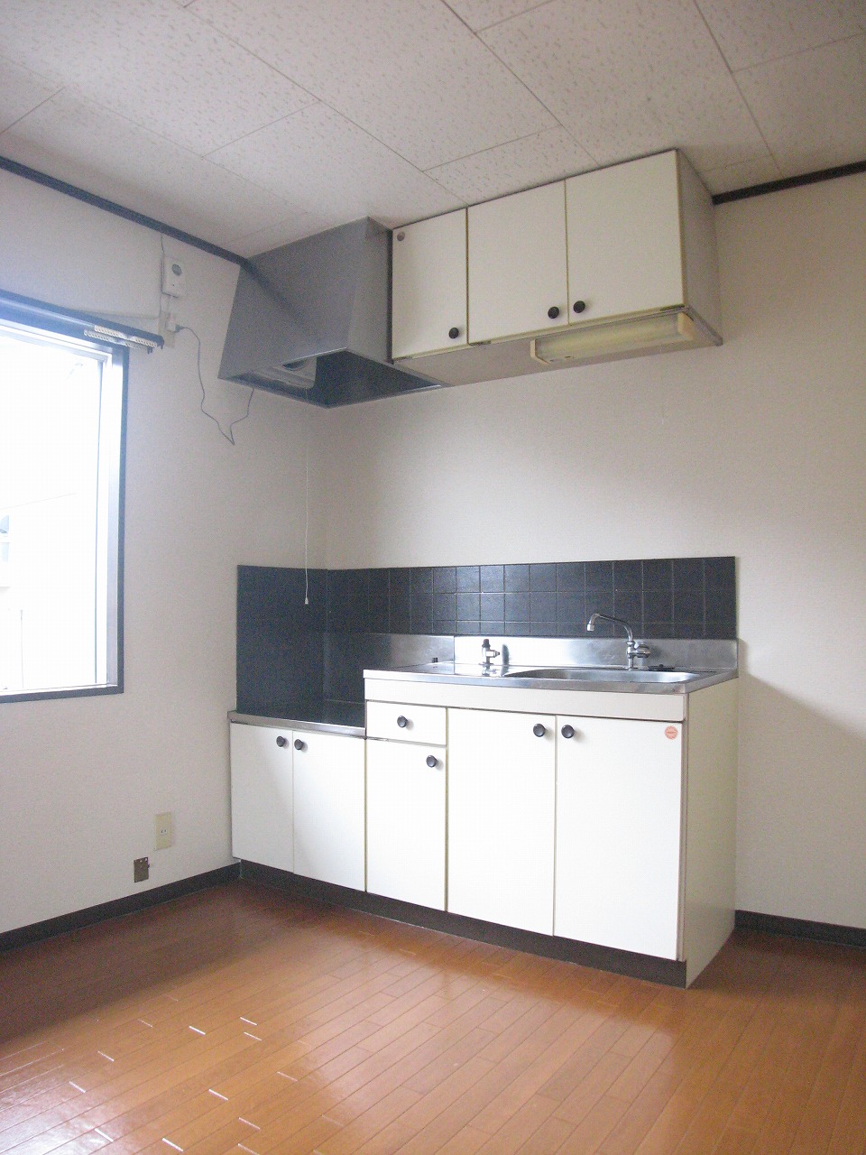 Kitchen. There is a window next to the kitchen!