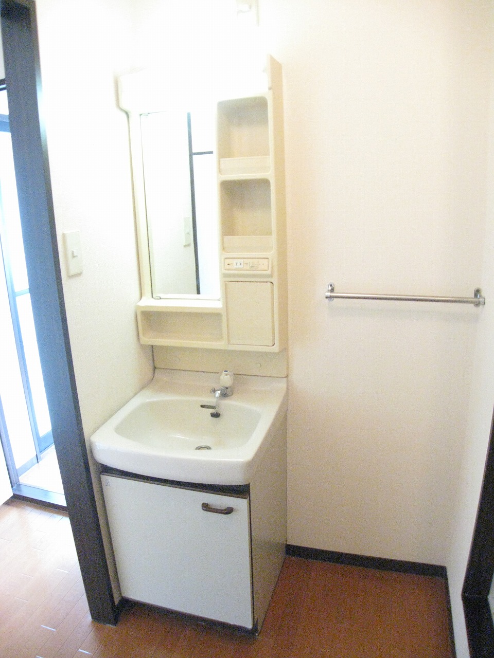 Washroom. Opposite side of the wash basin is the washing machine Storage.